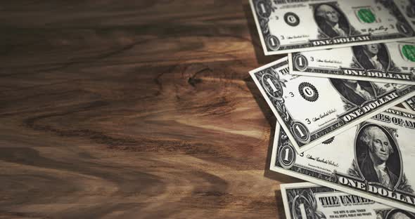 Dollar one USD money banknotes background loop alt