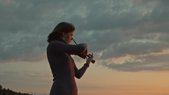 Woman Violinist Playing Solo Outside alt