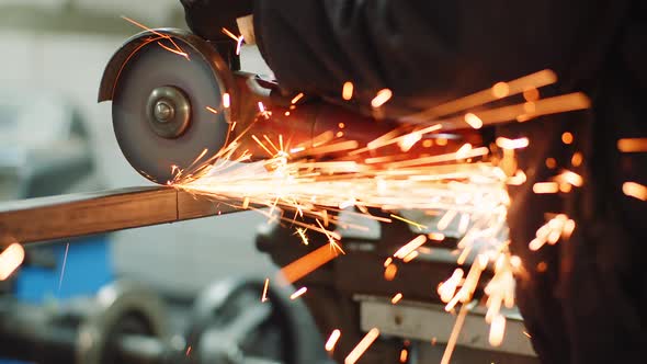 Falling Spark During Cutting Metal with Angle Grinder alt
