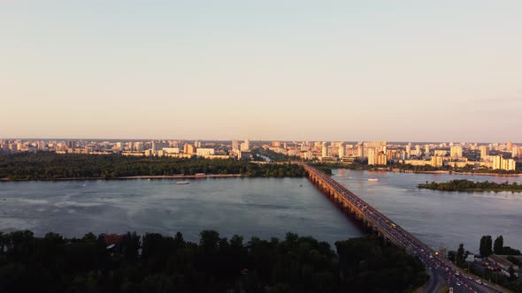 panorama of Kyiv, capital of Ukraine and Dnieper River, day and evening time sunset. alt