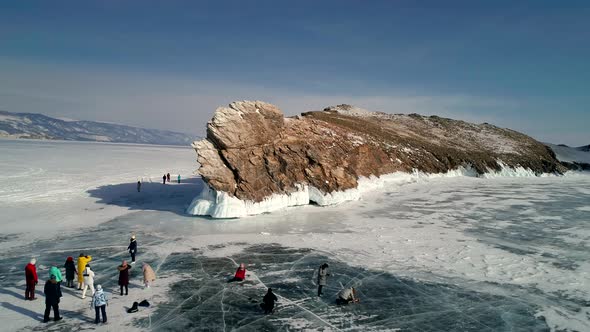 Aerial View on the Rocky Ice Covered Island in Lake Baikal alt