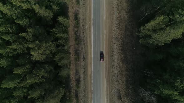 Top down aerial view of asphalt road in the forest 11 alt