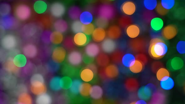 Defocused shine Christmas lights balls holiday decorations, abstract blurry bokeh background effect