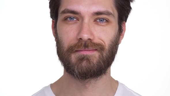 Young Male Looking Calm with Affection on White Background alt