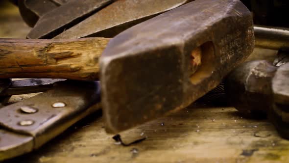 Camera dollies across old and grimy tools alt