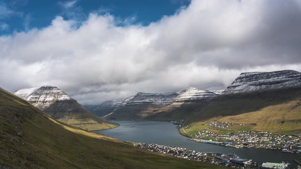Timelapse of Clouds Moving Above Klaksvik and Nearby Mountains on Faroe Islands alt