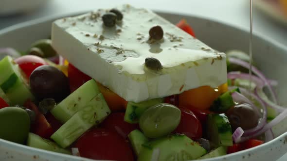Olive Oil Filling of Greek Rustic Village Horiatiki Salad with Whole Feta Cheese