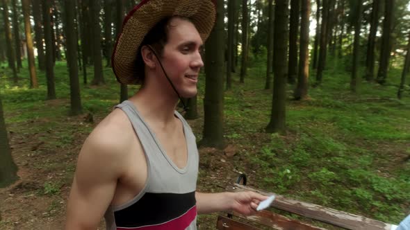 Guy in a Straw Hat Says Goodbye to a Girl in a Blue Shirt alt