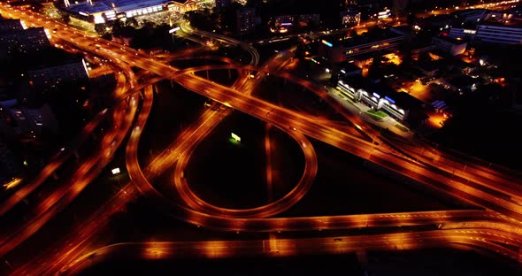 4K - Night city traffic. Aerial view timelapse