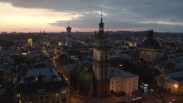 Flight Above the Roofs on Sunset. Old European City. Ukraine Lviv
