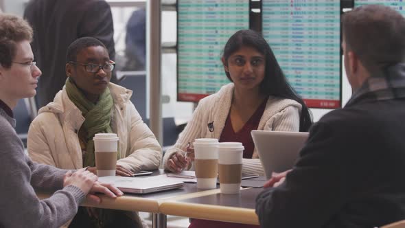 Group of businesspeople meeting at airport