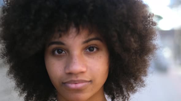 portrait and close up of beautiful young African or American woman with close eyes dreaming alt