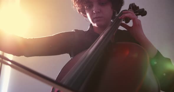 Closeup of a Female Cellist Playing