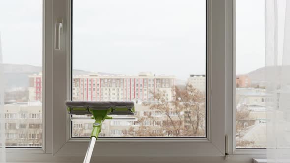 Window Cleaning of Special Mop for Washing the Glass Surface of Windows alt