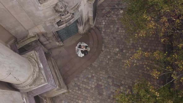 Lovely Newlyweds Caucasian Bride and Groom with Bouquet in Park Wedding Couple First Meeting alt