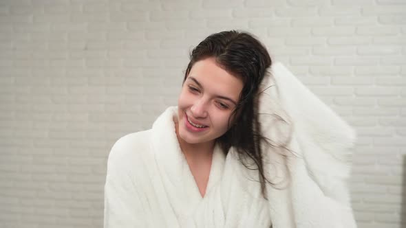 Girl Drying Wet Hair with Towel alt