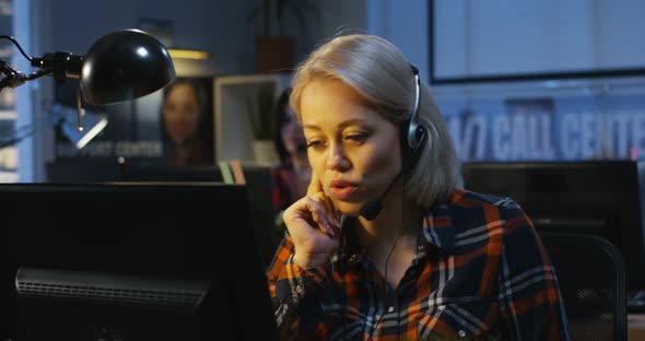 Two Woman Working at a Call Center alt