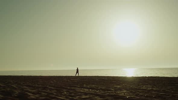 Unknown Sportswoman Running Seaside alt
