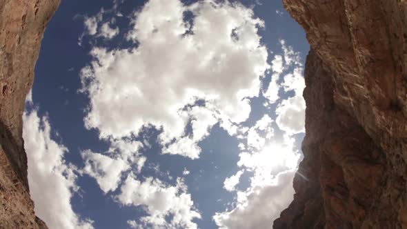 Between Rocky Cliffs alt