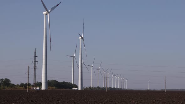 Row of Wind Farms in The Field