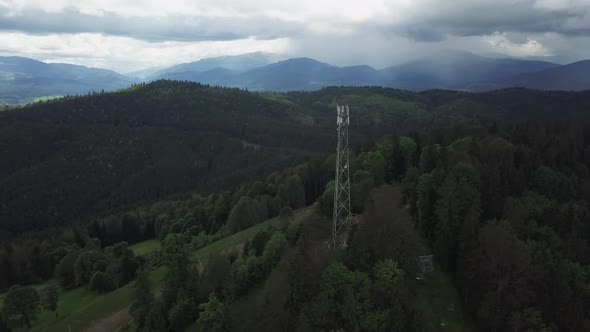 5G, 4G Communication tower antenna on mountain at twilight