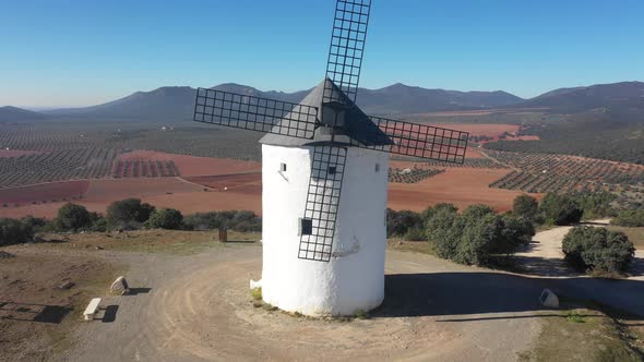 Aerial view of windmills in the countryside in Spain alt
