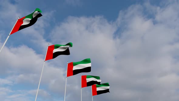 Waving Flags Of The United Arab Emirates blue sky alt