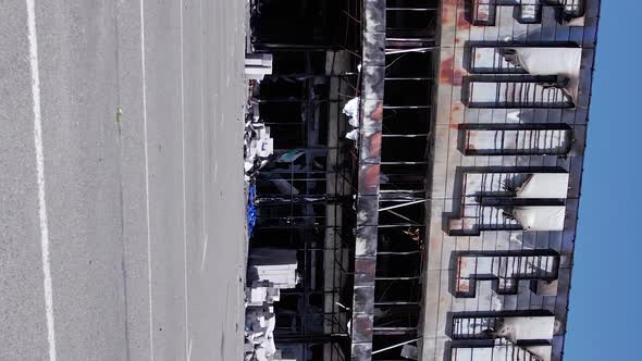Vertical Video of Bucha Ukraine  a Destroyed Shopping Center During the War alt