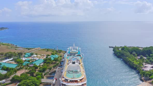 Aerial flyover port of La romana with docking cruise ship in summer - Beautiful Caribbean Sea,Domini alt