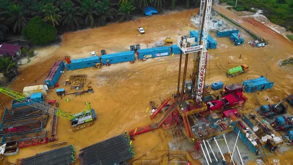 Cinematic Drone Shot of Onshore Drilling and Workover Rig structure and Rig equipment for oil explor alt