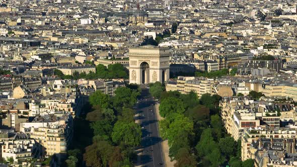 Aerial Drone Distant Sunset View of Tour Eiffel Tower and Seine River Bridge Traffic Cars Driving alt