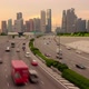 Skyscrapers and Traffic on a Multi-Lane Highway - VideoHive Item for Sale