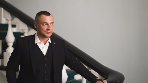 Gentleman in Classic Suit with Vest and Shirt on Staircase alt