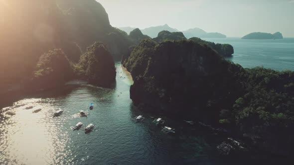 Passenger Boats at Sun Reflection of Ocean Bay Aerial alt