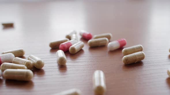 Many Pills Fall To The Table