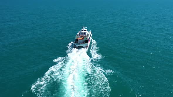 Aerial view to speed yacht in the sea