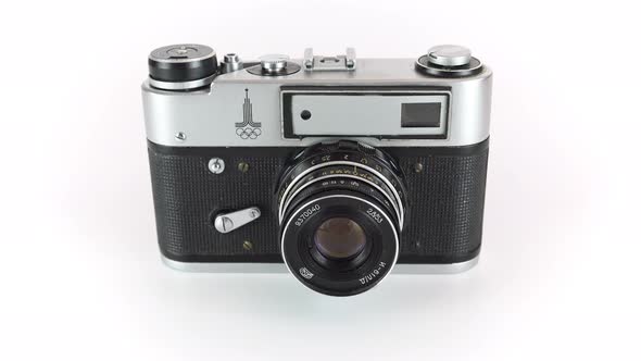 Film Soviet Rangefinder Camera On A White Background. 
