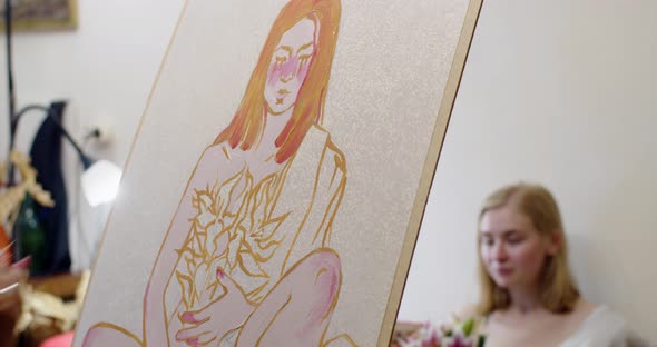Unrecognizable Artist Making Art Portrait of Caucasian Girl Sitting Behind on Sofa Indoors Studio