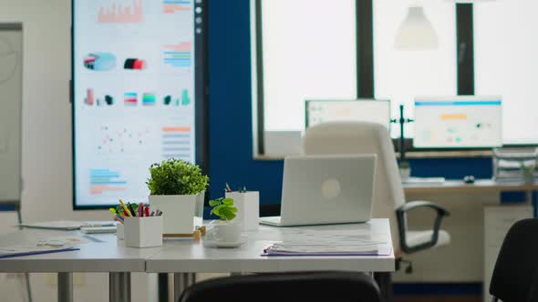 Interior of Cozy Light Company Room with Conference Table Ready for Brainstorming alt