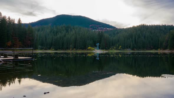 Autumn Sunset at Mountain Lake with Colorful Trees in the Forest alt