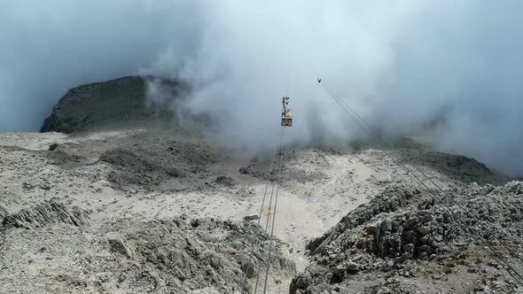 Cable Car "Olympos Teleferik" Moving Upon Tahtali Mountain Slope. Kemer, Turkey. alt