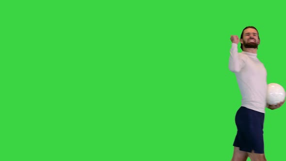 Excited Soccer Player Runs and Celebrates a Goal on a Green Screen Chroma Key