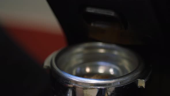 Process of Semiautomatic Filling of Ground Coffee Beans Into a Mold for a Coffee Machine alt