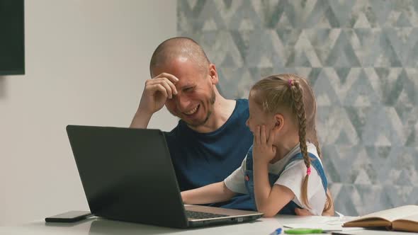 Closeup Slow Motion of Daddy on His Lap alt
