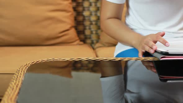 Close Up Women Playing Tablet