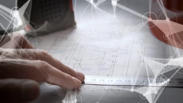 Man Makes Notes on the Blueprints alt