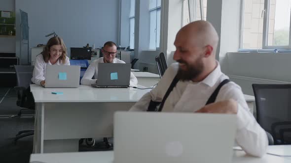 Happy Smiles and Faces of Young Coworkers alt