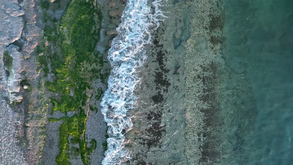 Texture of the rocky beach aerial view 4 K Turkey Alanya alt
