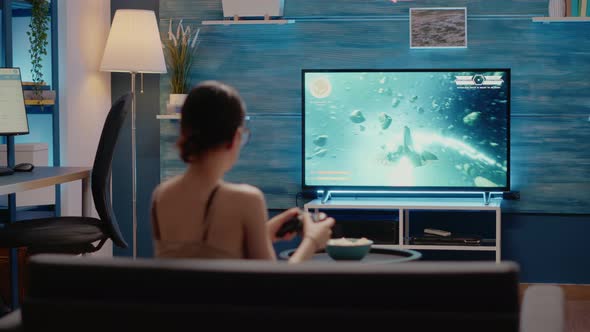 Caucasian Woman Winning Videogames Competition alt