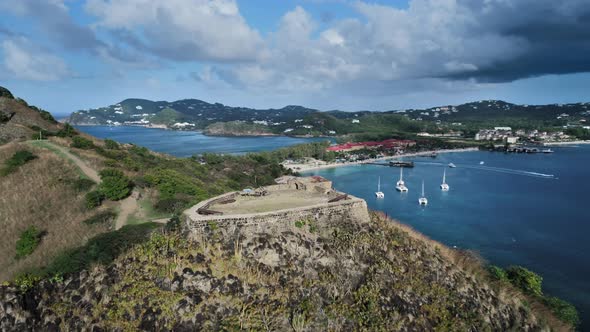 Aerial shooting of Fort Rodney on a mountain at Rodney Bay, Saint Lucia alt